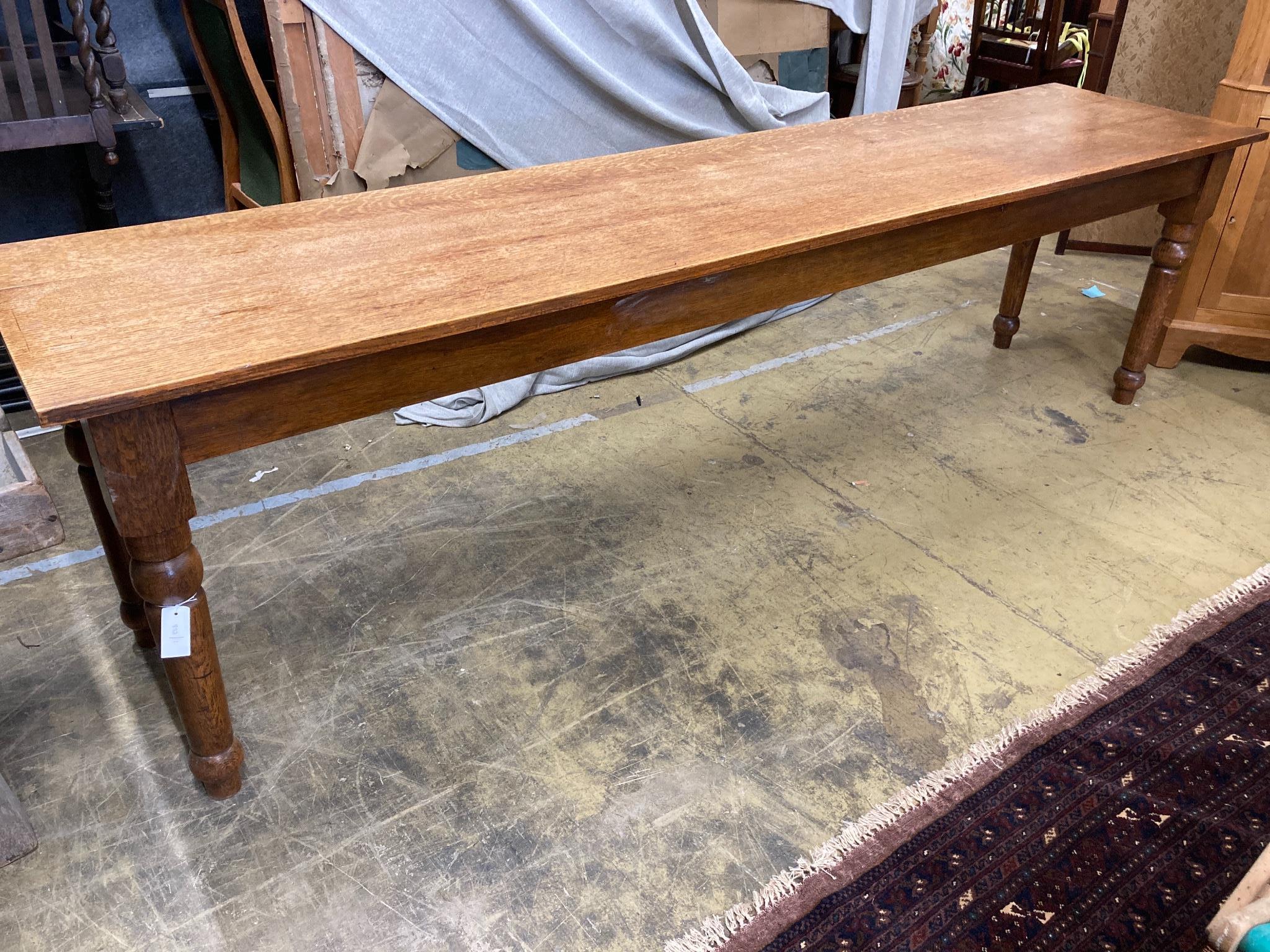 A Victorian style narrow oak rectangular refectory or serving table, length 267cm, width 61cm, height 76cm